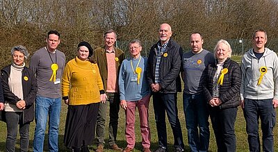 Liberal Democrat Councillors from Basingstoke and Deane standing in a row in a field