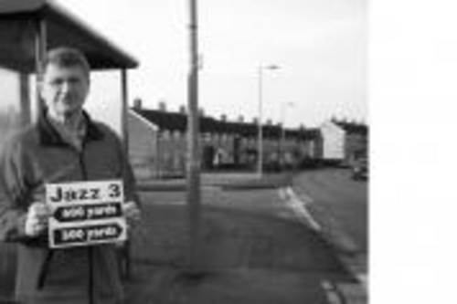 Councillor Ron Hussey at the redundant bus stop at Pinkerton road/Stag Hill junction